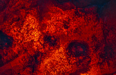 Natural amber texture. Multicolored background for advertising and banners. Vintage fossilized resin as a background. Red amber amber background. Close-up amberの写真素材