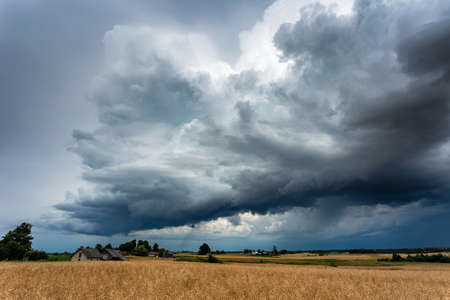 Thunder storm clouds across the fields, summer, Lithuaniaの写真素材