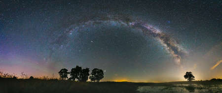 Panorama view of milky way in the night sky, deep starry sky with Milky way over headの写真素材
