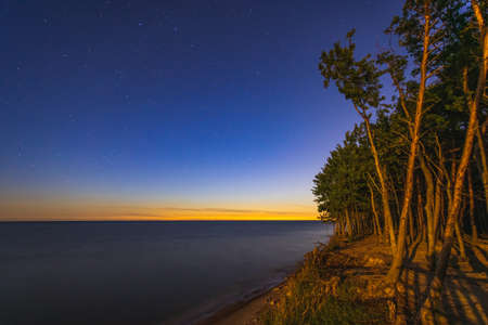 Dutch man cap landscape at night in Lithuania. Beautiful seaside landscapeの写真素材