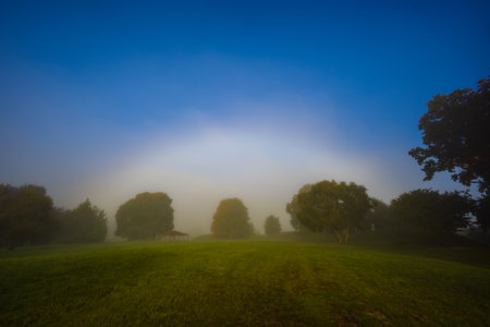 Rare White Rainbow Fogbow landscape in the morningの写真素材