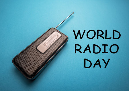 World Radio Day 13 February text with radio on blue background. Selective focusの写真素材