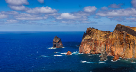 Volcanic sea cliffs of the Sao Lourenco peninsula, eastern Madeira, Portugal, Atlantic Oceanの写真素材