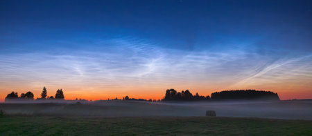 Night landscape with Noctilucent clouds at Lithuaniaの写真素材