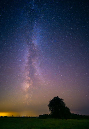 Night landscape with colorful Milky Way, autumn skyの写真素材