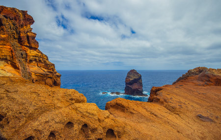 Volcanic sea cliffs of the Sao Lourenco peninsula, eastern Madeira, Portugal, Atlantic Oceanの写真素材