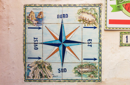 Vintage Compass Tile Art featuring Directional Markings and Engaging Geometric Patterns in Capri islandの写真素材