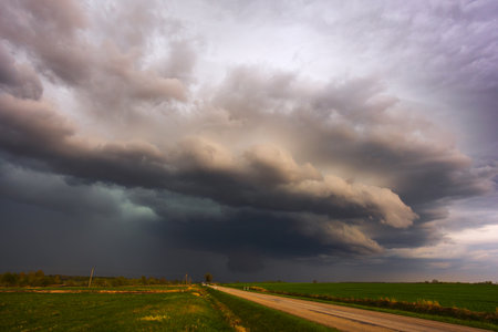 Dramatic storm clouds in the sky, dark severe storm clouds, supercell.の写真素材