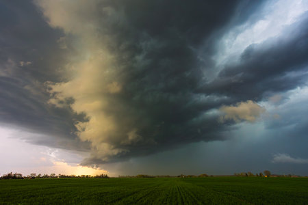 Dramatic storm clouds in the sky, dark severe storm clouds, supercell.の写真素材