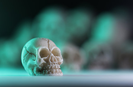 Miniature skulls background. Skull backgroundの写真素材