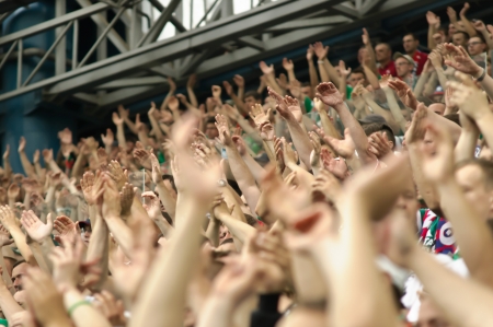 Crowd wave hand in stadium のeditorial素材