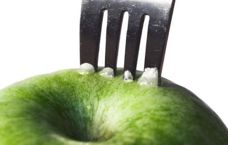 apple, autumn, crutch, cutlery, diet, drew, drop, eat, fall, fork, fruit, green, prong, vitamin, water, yellow,の写真素材