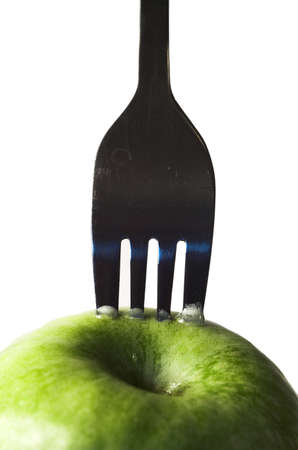 apple, autumn, crutch, cutlery, diet, drew, drop, eat, fall, fork, fruit, green, prong, vitamin, water, yellow,の写真素材
