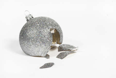 broke, broken, bust, busted, christmas,  glass,white, backround, after, silverの写真素材
