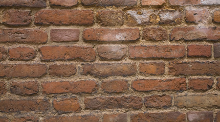 old bricks fortification background red whit stone