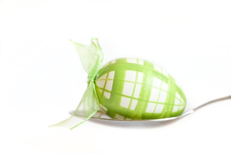 one easter egg on white background の写真素材