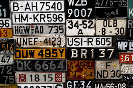 Various old car license plates from around the world at the museumのeditorial素材