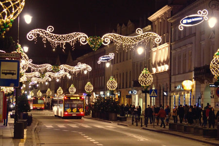Light colored Christmas decorations at night the streets of Warsaw, Polandのeditorial素材