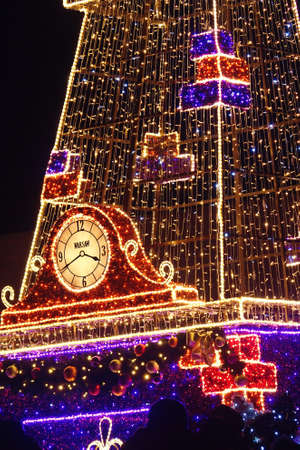 Light colored Christmas decorations at night the streets of Warsaw, Polandの写真素材