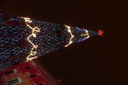 Light colored Christmas decorations at night the streets of Warsaw, Polandの写真素材