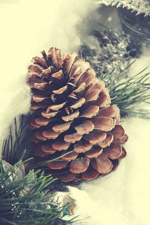 elegant Christmas decoration with snow cones and green pine twigs,の写真素材