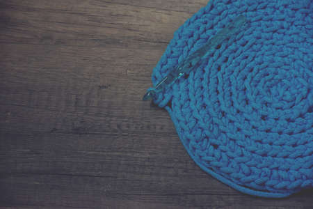 Blue crochet knitting manual pad on the table hand knitting,の写真素材