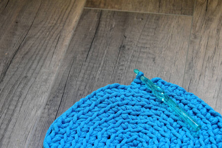 Blue crochet knitting manual pad on the table hand knitting,の写真素材