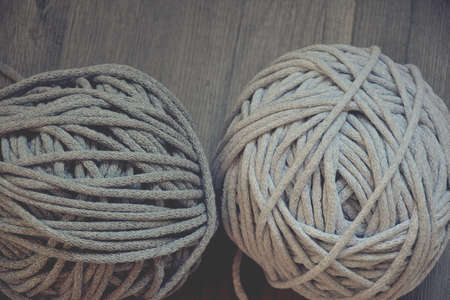 grey handmade cotton cord tablecloths on crochet hookの写真素材