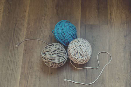 grey handmade cotton cord tablecloths on crochet hookの写真素材