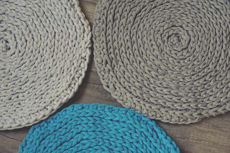grey handmade cotton cord tablecloths on crochet hookの写真素材