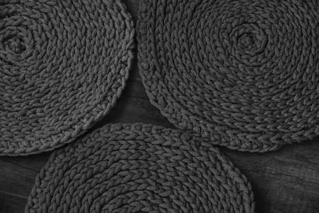 grey handmade cotton cord tablecloths on crochet hookの写真素材