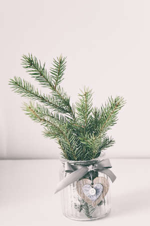 adorable Christmas tree decoration in a decorative jugの写真素材