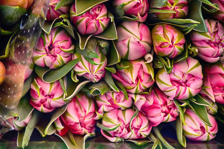 colorful beautiful spring large bunches of tulips lying on a market stall