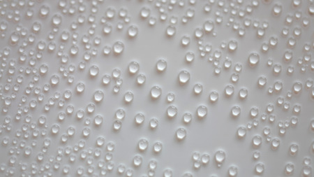 beautiful white background with small very round droplets of water