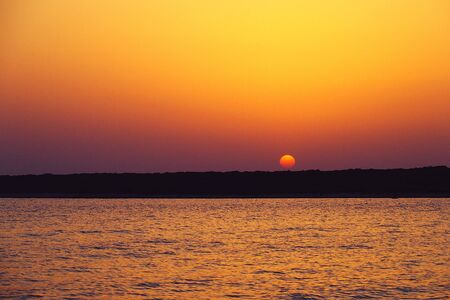beautiful calm colorful sunset landscape on the sea