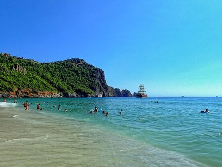 beautiful famous sandy Cleopatra beach in Turkish Alanya on a warm summer dayの写真素材
