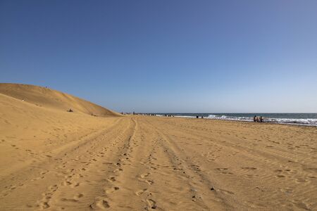 beautiful summer desert landscape on a warm sunny day from Maspalomas dunes on the Spanish island of...