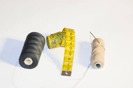 sewing supplies on a light smooth background