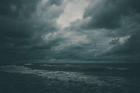 beautiful wide beach on the Baltic Sea in Poland on a summer cloudy gray cold day