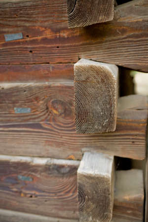 old surface-mounted wooden structure of a hut without nails in Polish Podlasie, close-up backgroundの写真素材