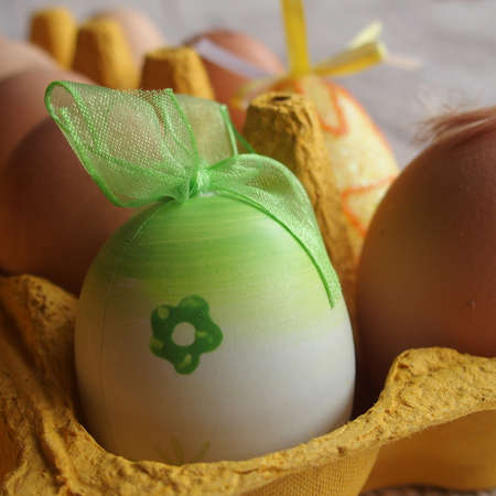 beautiful Easter colorful painting in an ecological container