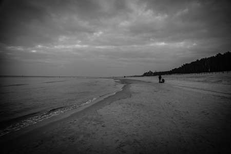 beautiful landscape by the baltic sea on a calm gray cold day in Polandの写真素材