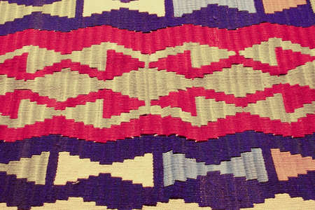 a beautiful interesting background with handmade Turkish rugs in close-up