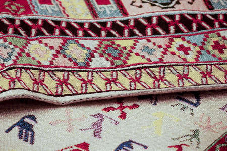 a beautiful interesting background with handmade Turkish rugs in close-up