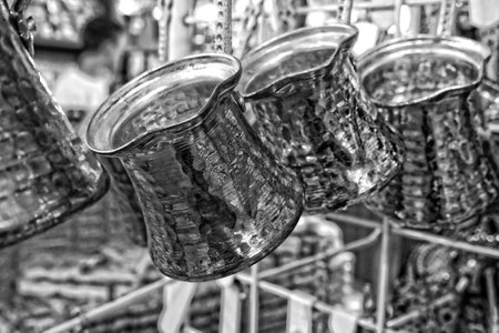 beautiful small elegant copper turkish coffee pots in the shop on displayの写真素材