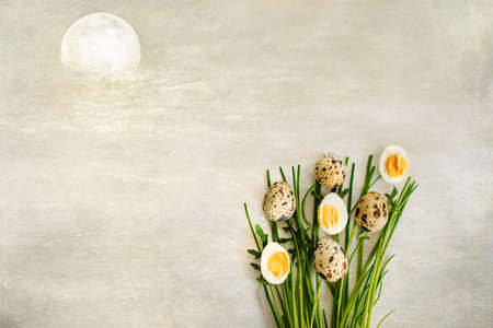 beautiful Easter card with quail eggs and green chives