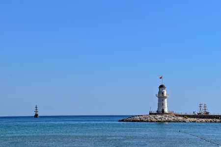 beautiful landscape of the port in the Turkish city of Alanya with the white tower on a warm summer...