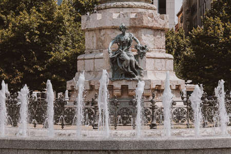 beautiful fountain in Zaragoza, Spain in the old town with an angelの写真素材