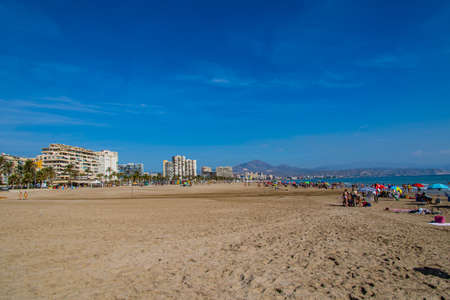 beautiful seaside landscape with a beach in the Spanish city of Alicante on a warm sunny dayの写真素材