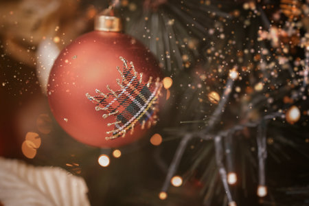 beautiful christmas bauble on a festive backgroundの写真素材